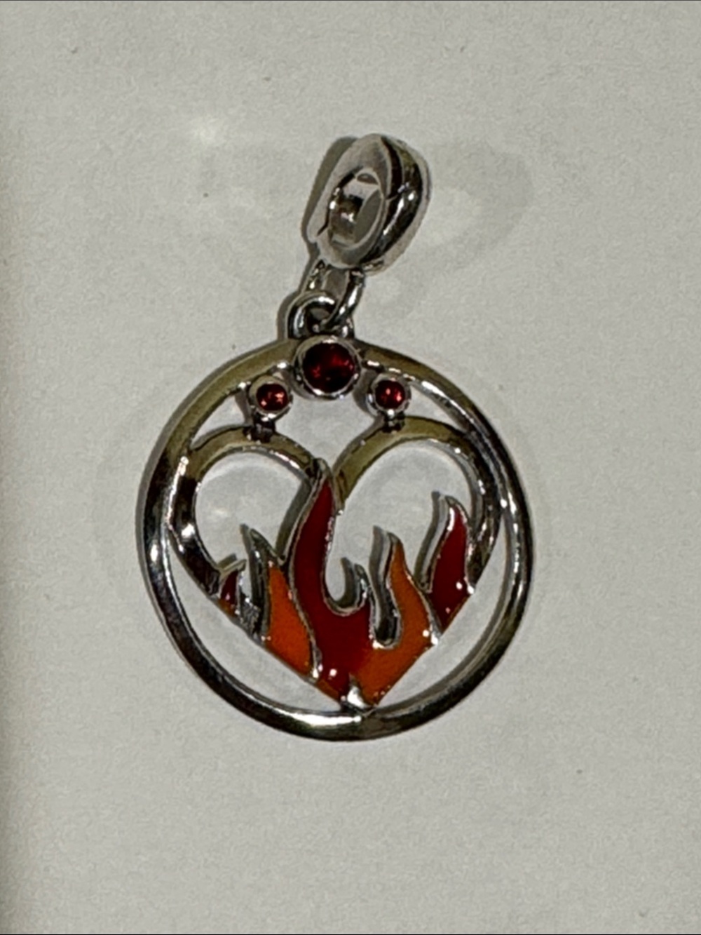 New pandora silver cristal fire medallion.